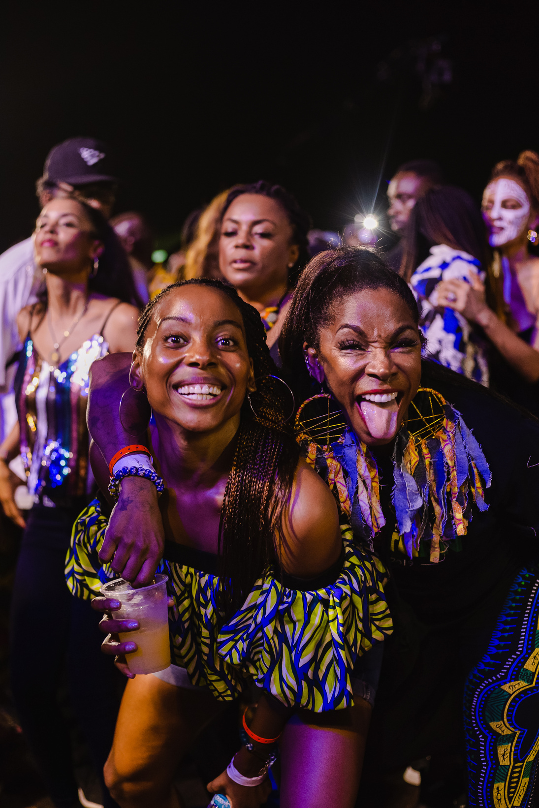 Cheerful Women in a Music Festival